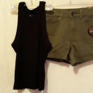 Black teeshirt with army green shorts